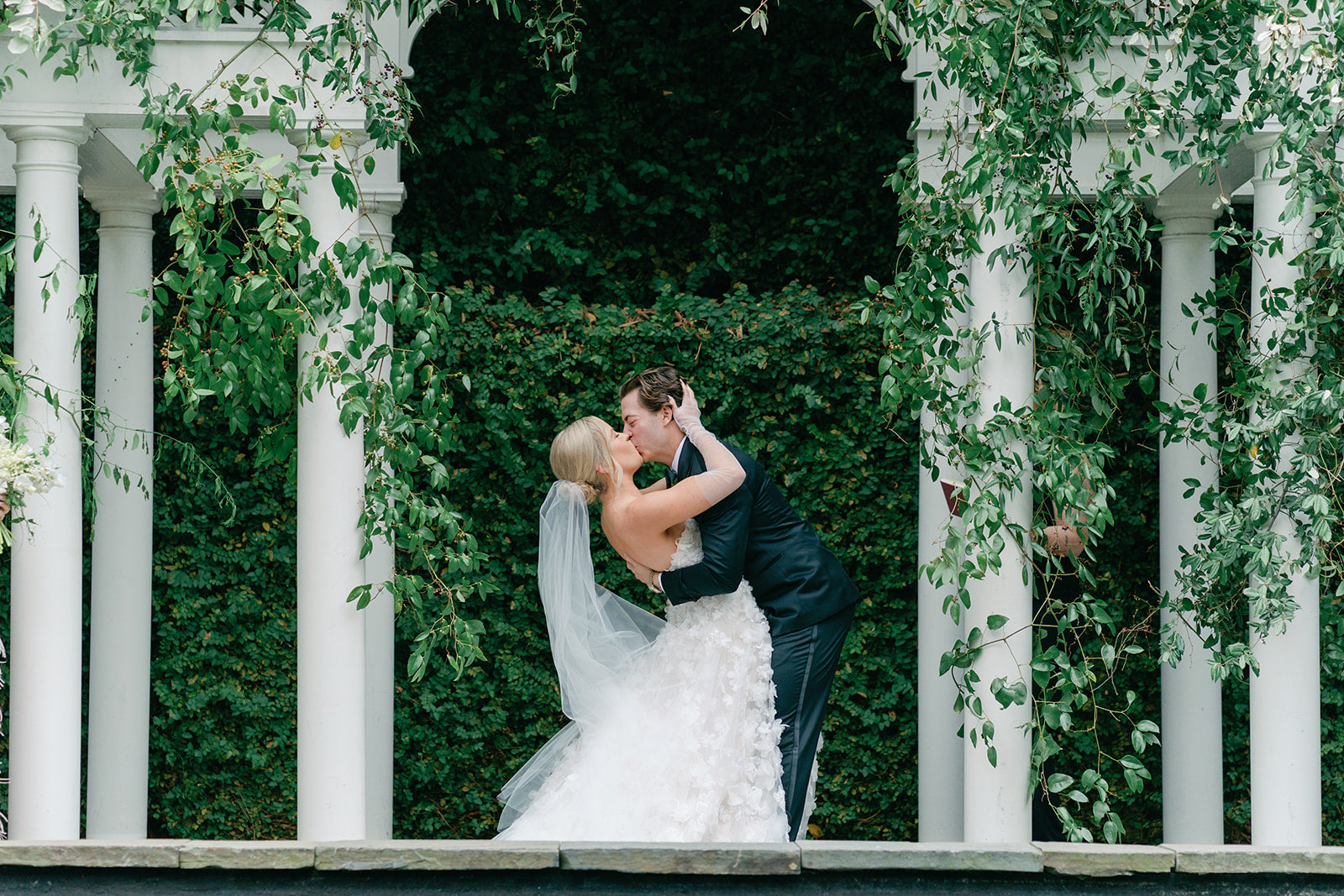 Bride and groom kissing